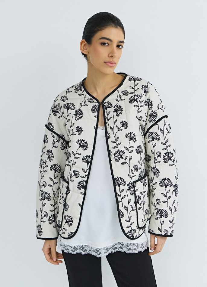 Легкая стеганная куртка