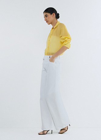 Широкие джинсы с асимметричной застёжкой