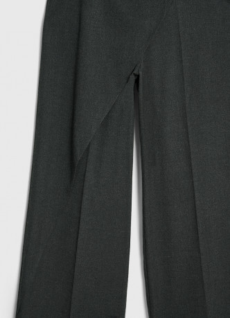 Широкие брюки с асимметричной деталью