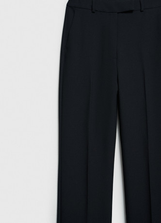 Расширенные книзу брюки