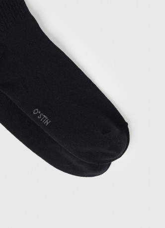 Высокие носки в рубчик