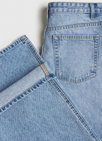 Широкие джинсы с асимметричной застёжкой