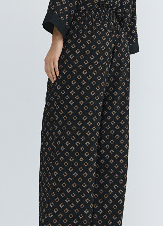 Прямые брюки с принтом и резинкой по поясу сзади