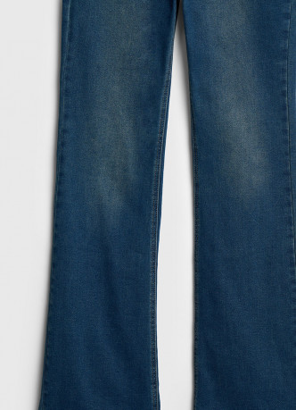 Расклёшенные утеплённые джинсы