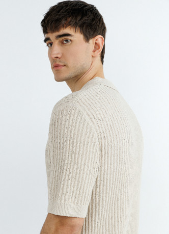 Вязаное поло из ажурной пряжи