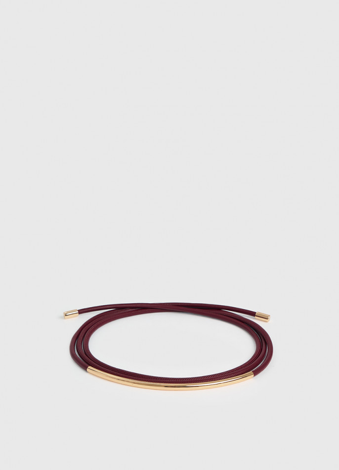 Пояс-шнур с металлической деталью