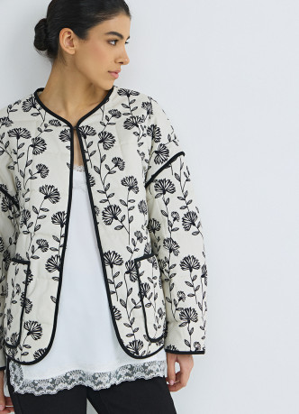 Легкая стеганная куртка