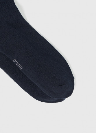 Высокие носки в рубчик