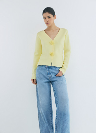 Широкие джинсы с асимметричной застёжкой