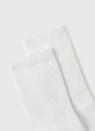 Высокие носки в рубчик