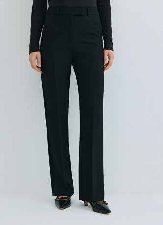 Расширенные книзу брюки