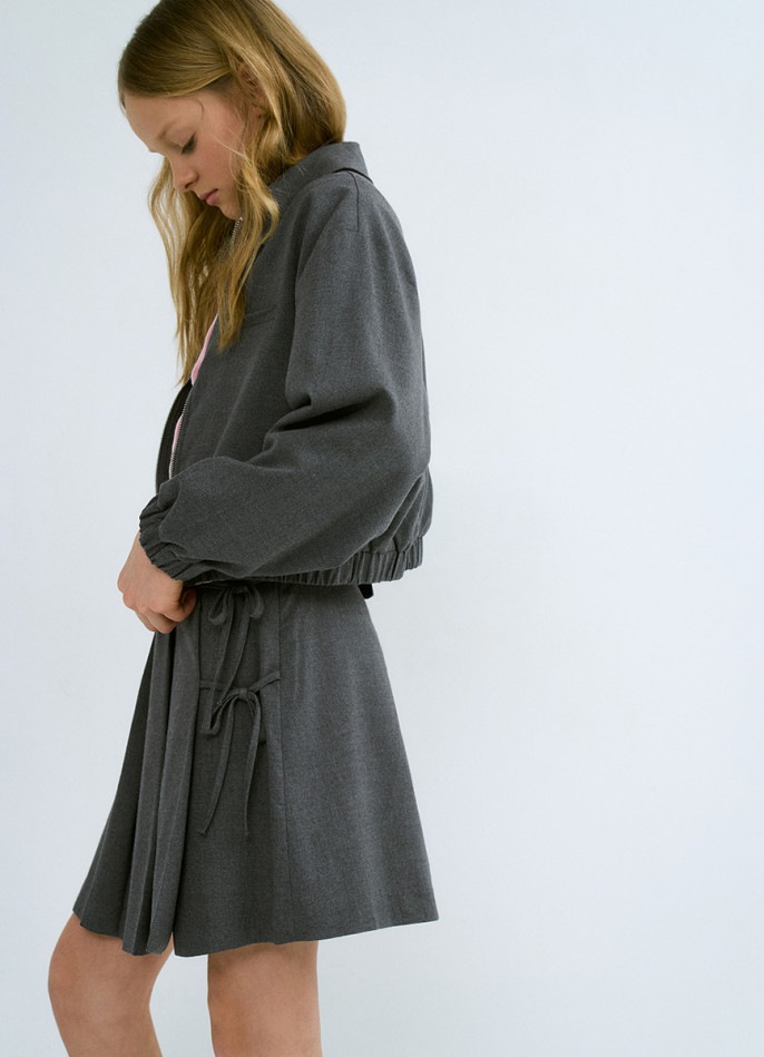 Юбка мини в складку с бантами для девочек