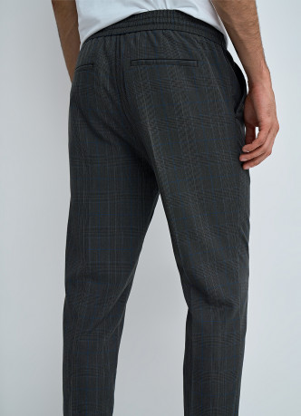 Брюки в клетку