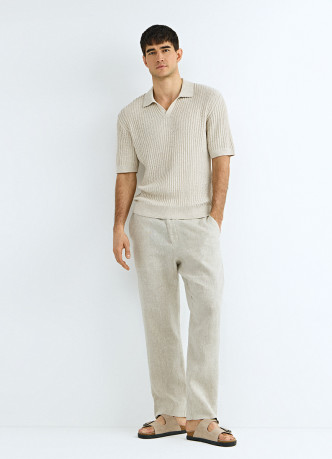 Вязаное поло из ажурной пряжи