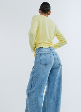 Широкие джинсы с асимметричной застёжкой