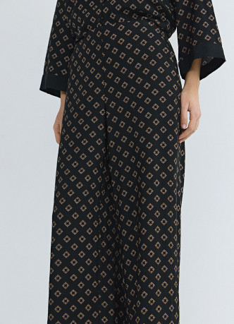 Прямые брюки с принтом и резинкой по поясу сзади