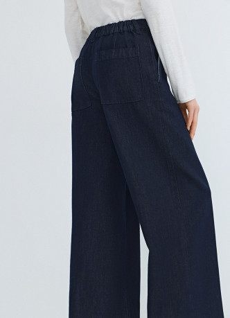 Широкие джинсы с поясом на резинке