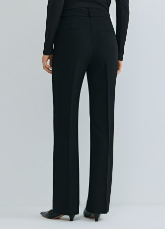 Расширенные книзу брюки