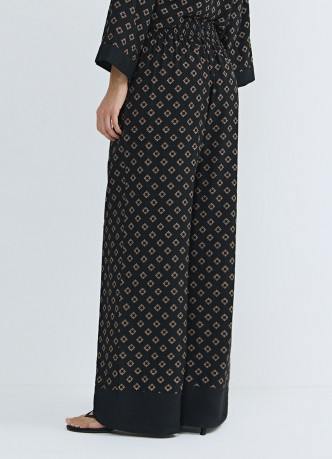 Прямые брюки с принтом и резинкой по поясу сзади