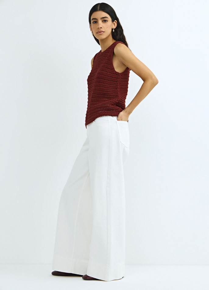 Широкие джинсы с плетением на поясе