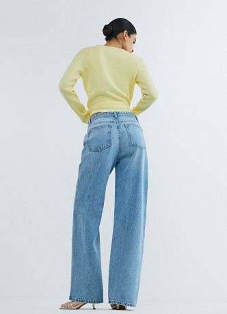 Широкие джинсы с асимметричной застёжкой