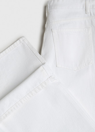 Широкие джинсы с асимметричной застёжкой