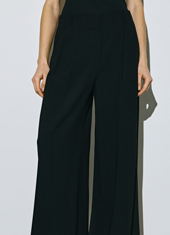 Прямые брюки со складками