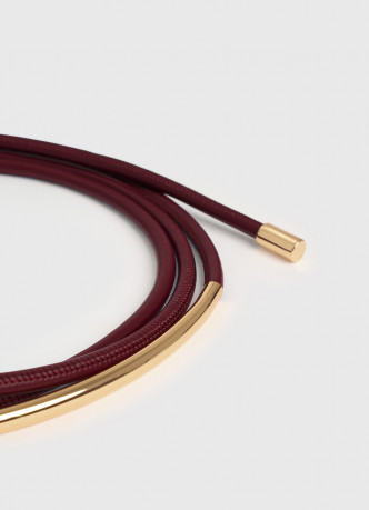 Пояс-шнур с металлической деталью