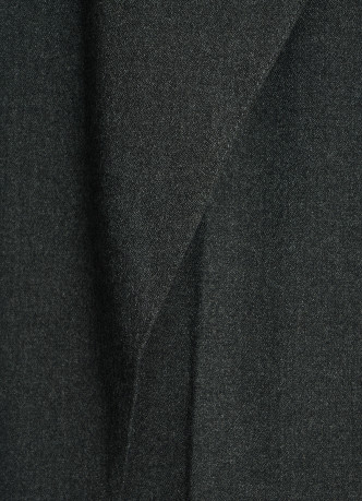 Широкие брюки с асимметричной деталью