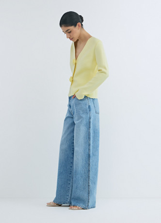 Широкие джинсы с асимметричной застёжкой