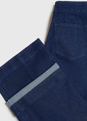 Широкие джинсы высокой посадки с декоративными пуговиицами